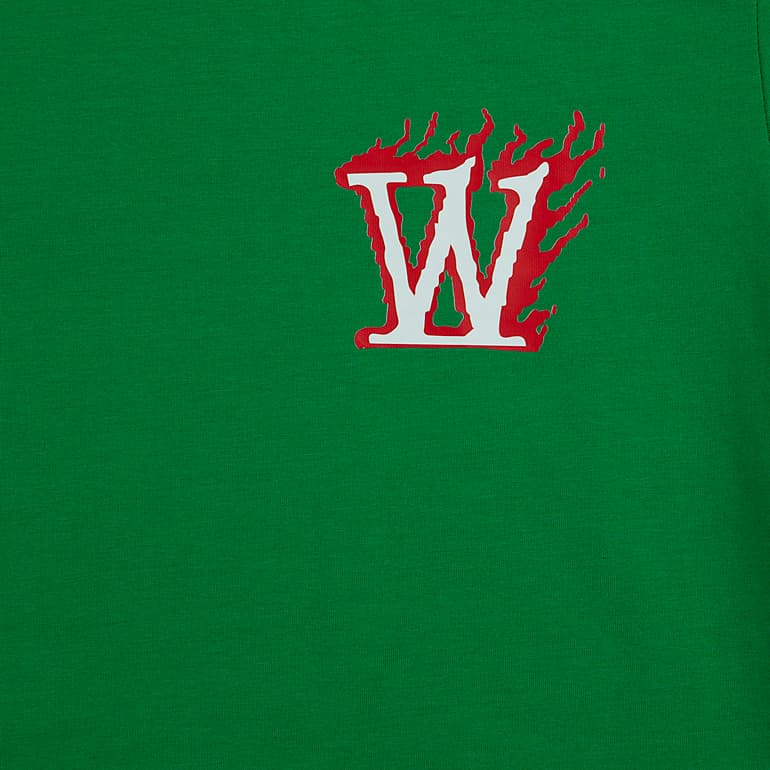 Emerald green crew neck t-shirt with small white and red flame "W" logo on the chest, laid flat.