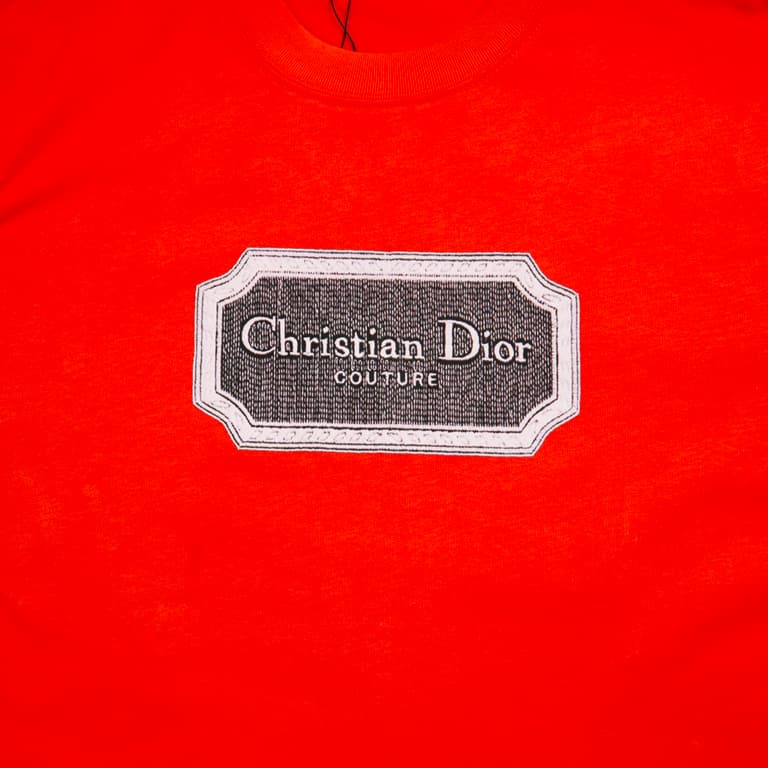 Scarlet Red Christian Dior t-shirt with brown couture patch logo graphic on chest, luxury unisex style