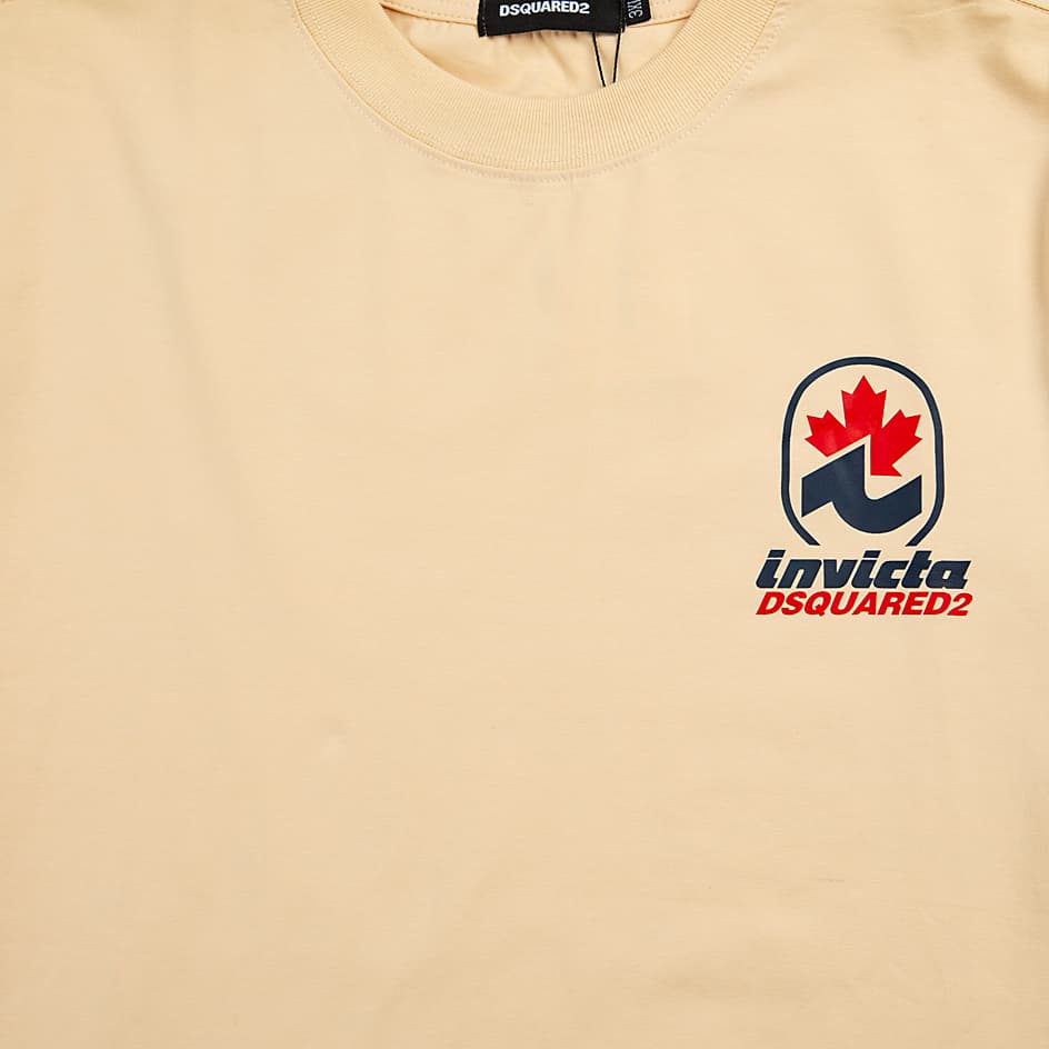 Tan Dsquared2 t-shirt with small Canadian Maple Leaf logo graphic on chest, short sleeves, unisex designer casual wear.