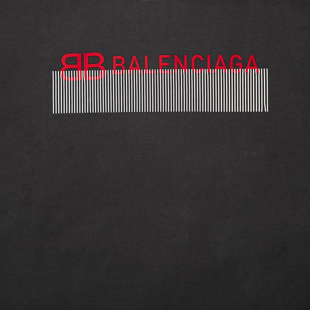 This statement Balenciaga T-shirt is a striking piece of luxury streetwear. It is made from soft, washed-effect cotton jersey for a vintage, worn-in feel.