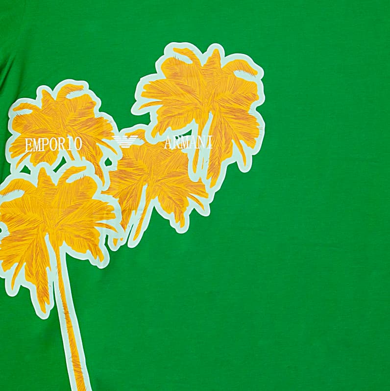 Kelly Green Emporio Armani t-shirt with large neon yellow palm tree graphic on chest, designer unisex casual wear.