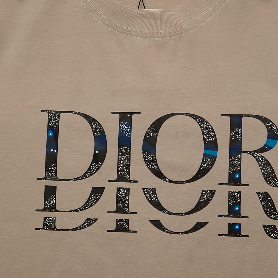Beige Christian Dior t-shirt with mirrored DIOR logo filled with Oblique print and blue sparkle details, designer cotton.