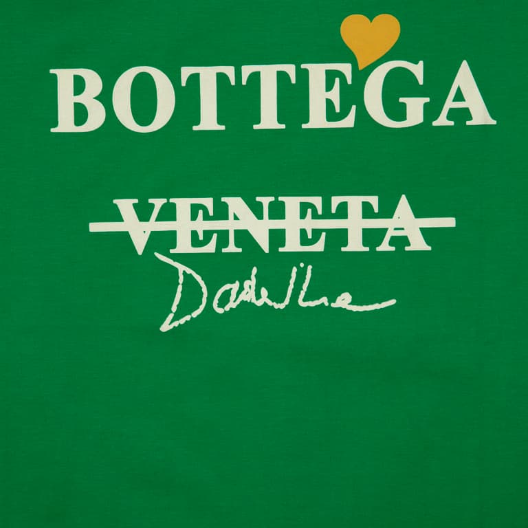 This is a relaxed-fit, short-sleeve cotton jersey T-shirt featuring a distinctive graphic print on the chest.