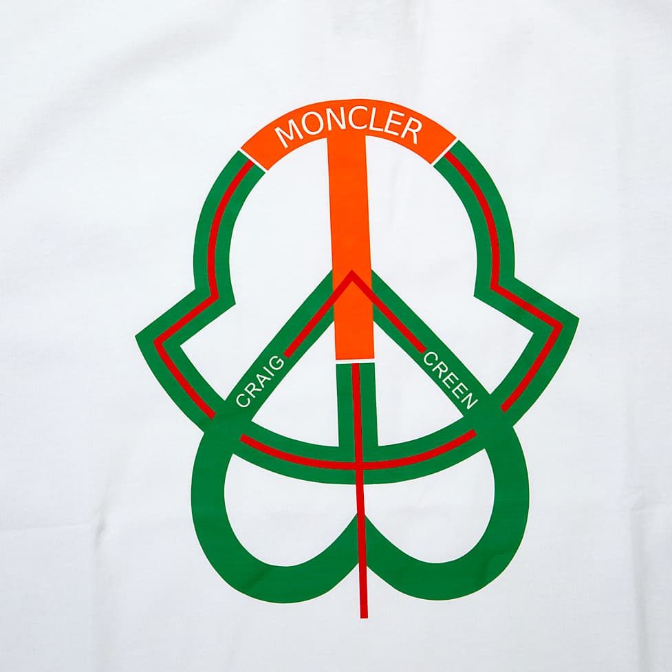 White Moncler Genius Craig Green sleeveless t-shirt with orange and green Peace/logo graphic, luxury cotton vest, unisex.
