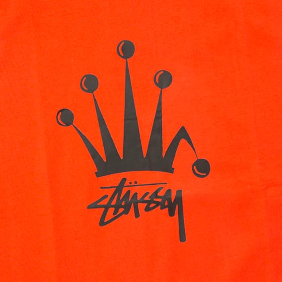 A vibrant, heavyweight cotton jersey sleeveless top (often called a muscle tank or muscle tee) from the pioneering streetwear brand Stussy.