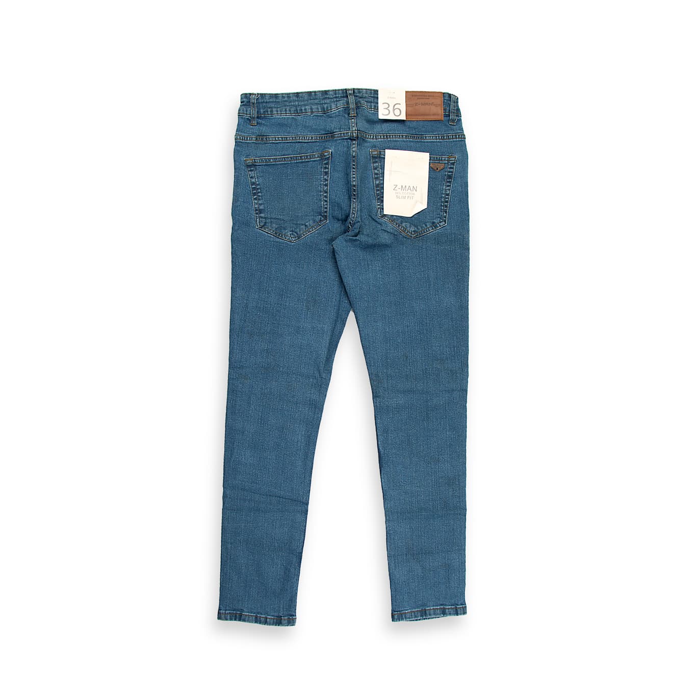 These are men's contemporary jeans featuring a classic, clean medium blue wash with minimal fading or whiskering, giving them a timeless look.