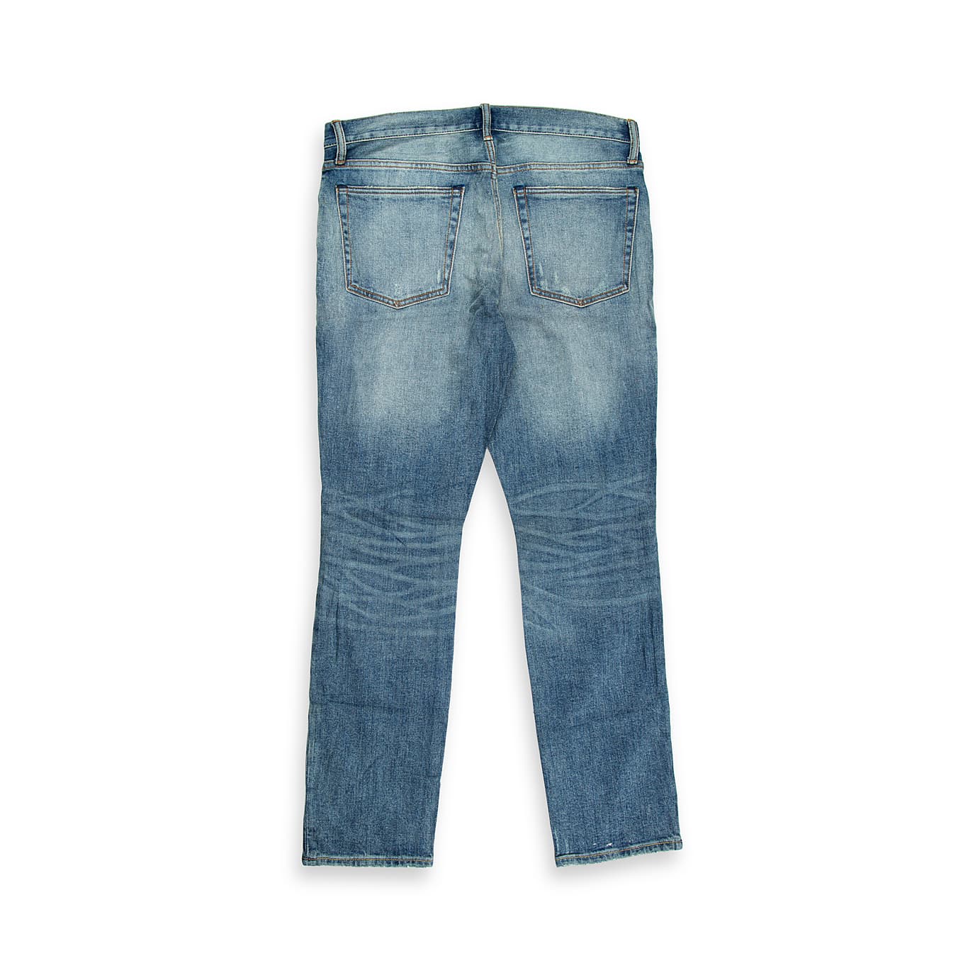 These versatile jeans are designed for all-day comfort and effortless style. Featuring a classic medium blue wash with natural fading and whiskering, they offer a casual, worn-in appearance.