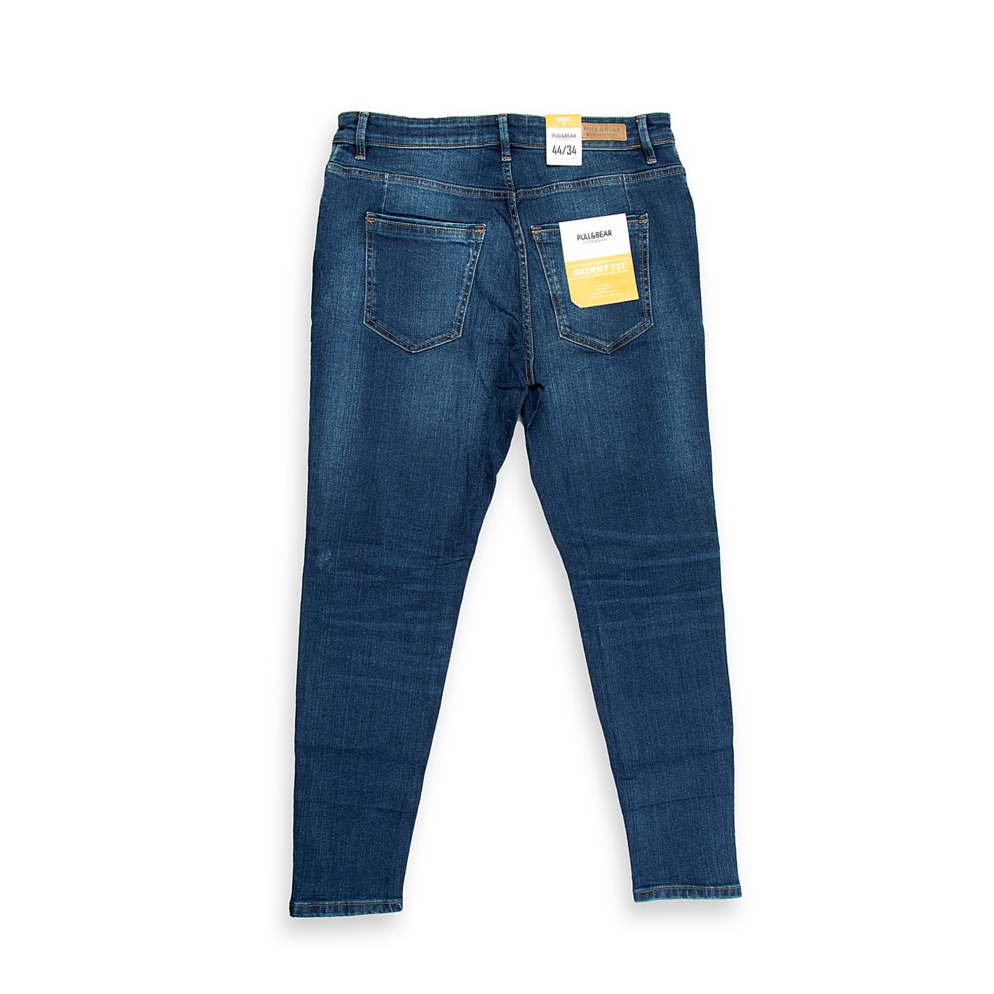 These modern slim-fit jeans are perfect for a smart-casual or evening look. They feature a rich, dark indigo blue wash with subtle natural whiskering and fading concentrated around the thighs.