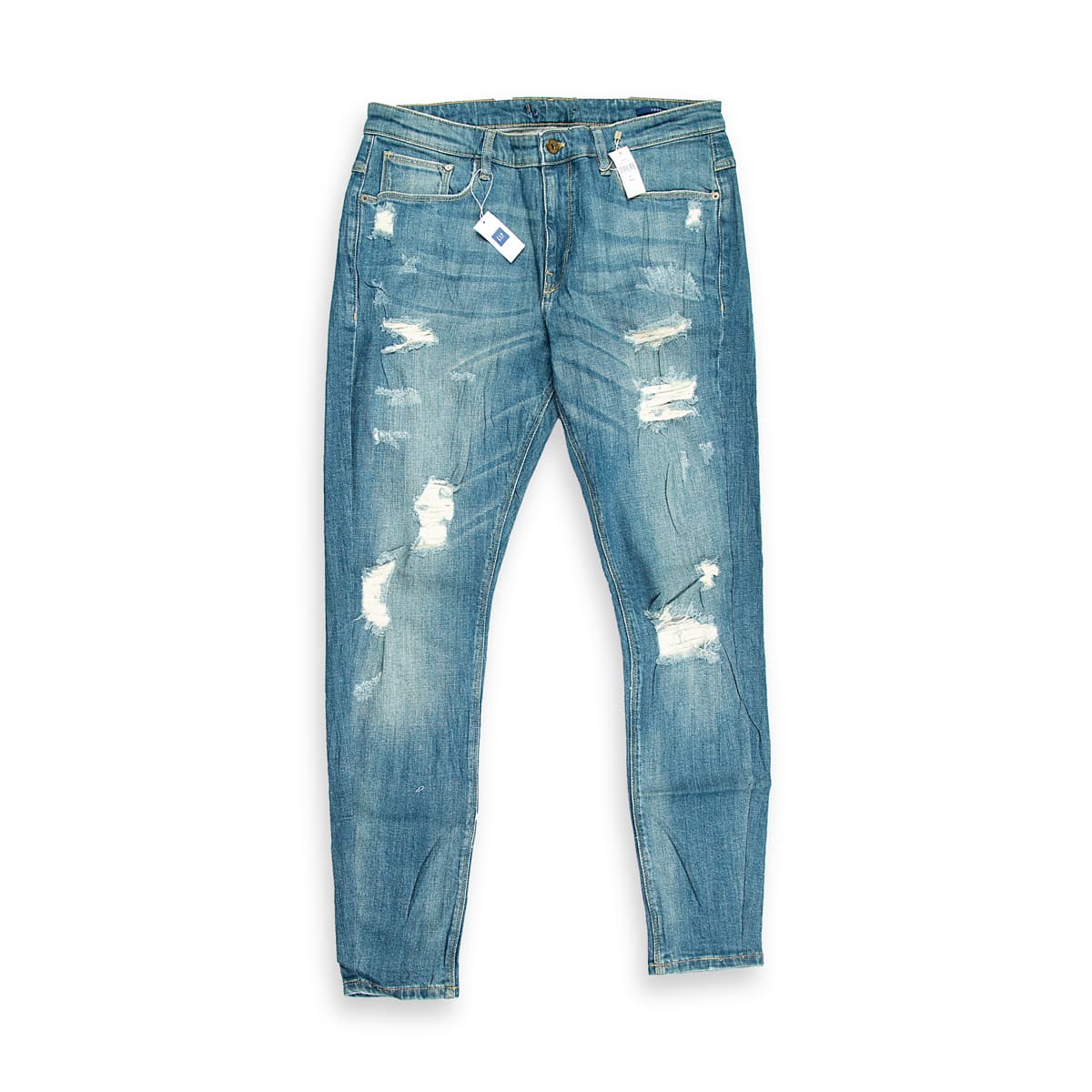These are a pair of skinny-fit jeans featuring a distressed medium/vintage blue wash. The denim has a slight textural grain and natural fading across the thighs and seat, giving them a worn-in, authentic look.