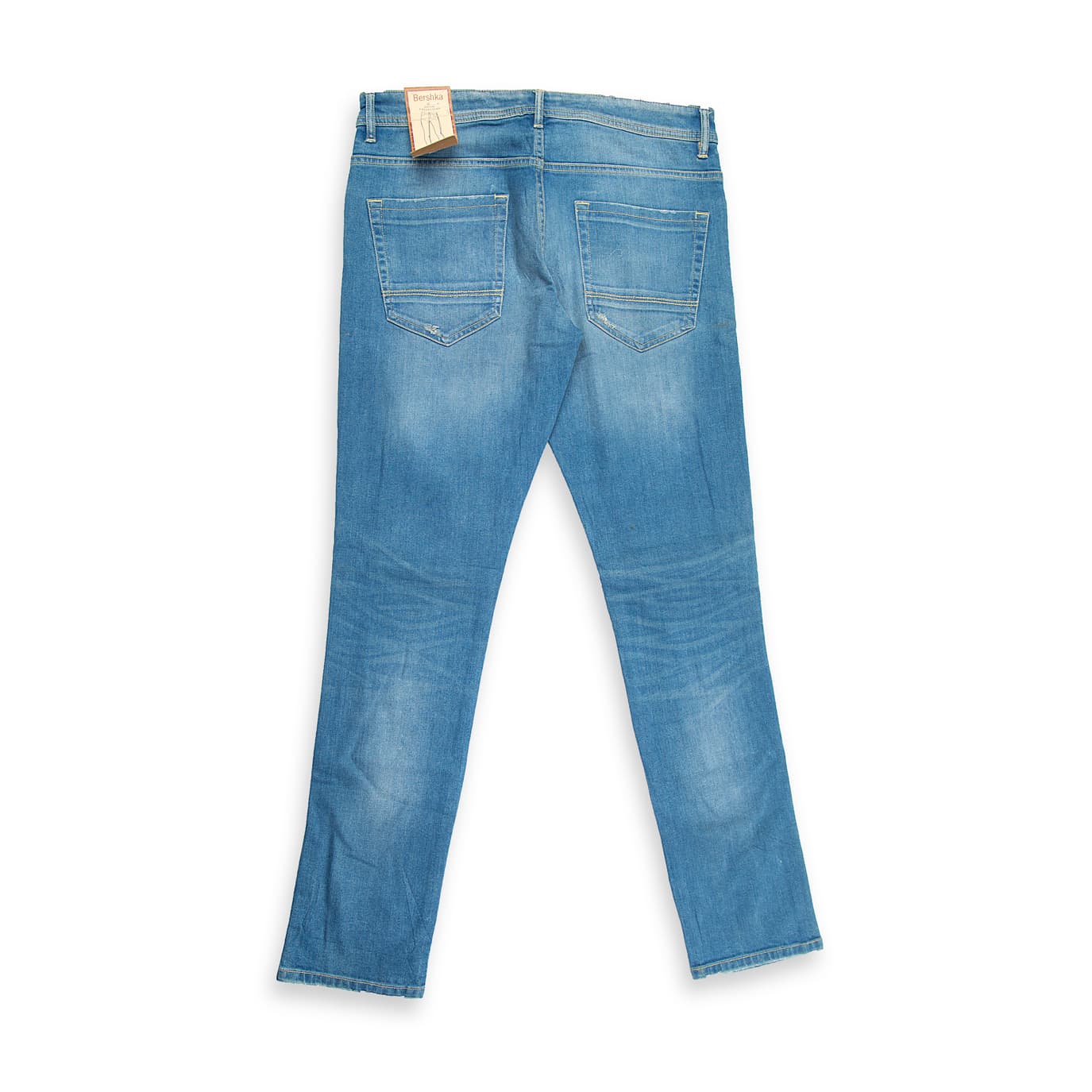 These are stylish, slim-fit denim jeans featuring a classic mid-wash blue finish.