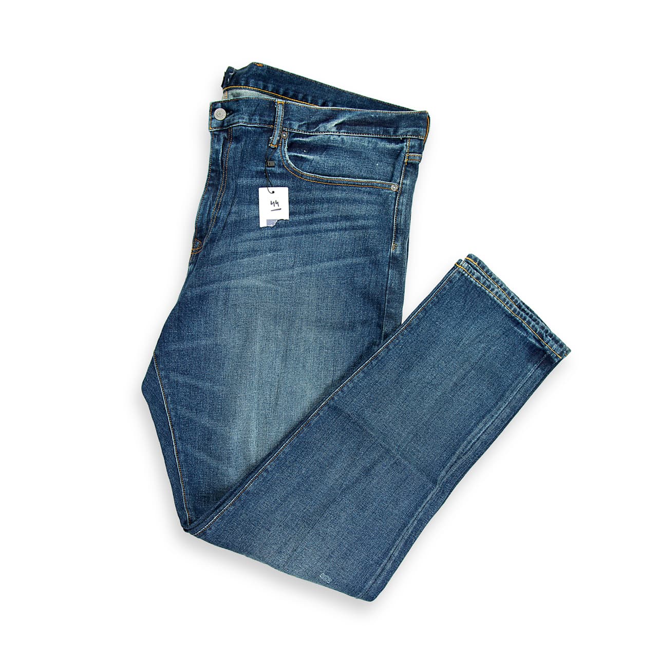 "Men’s blue distressed slim-fit jeans with ripped design – front view on white background."