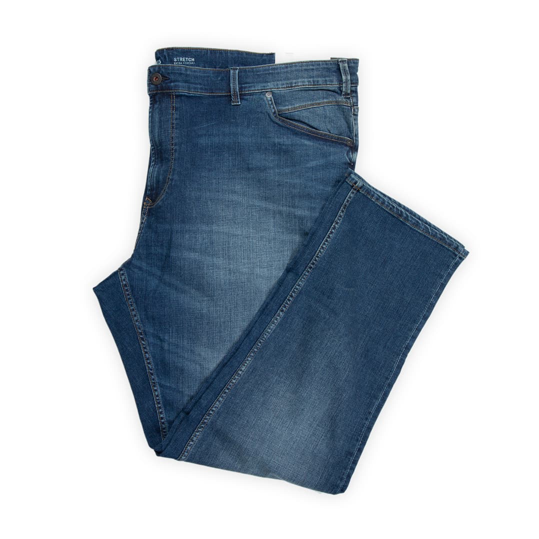 They feature a classic medium-blue wash with subtle, even fading across the thigh and seat.