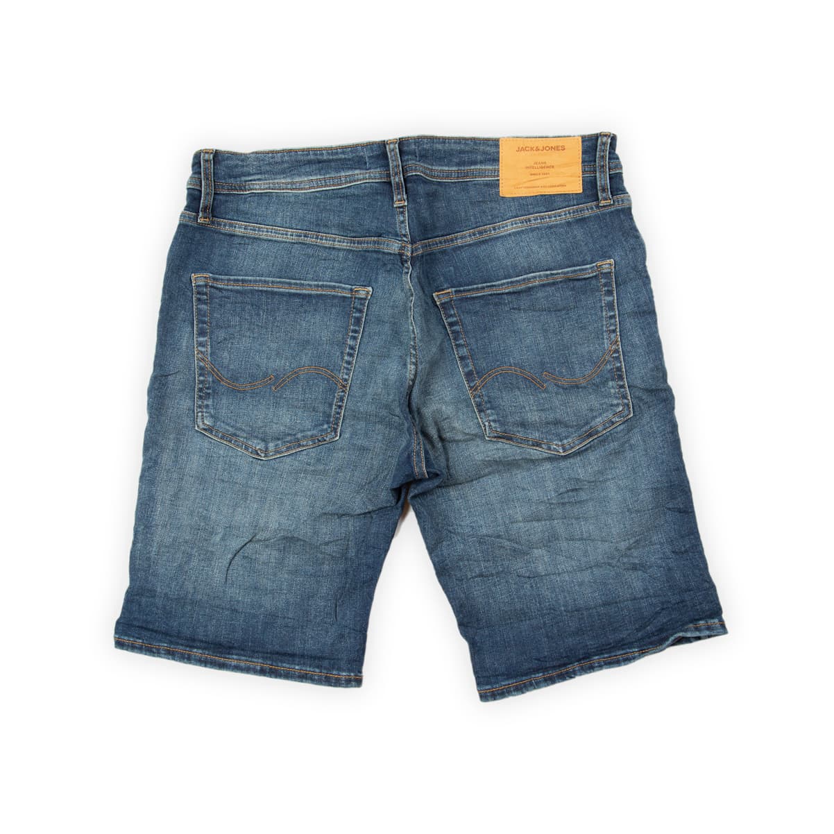 These versatile shorts are an excellent addition to any casual summer wardrobe. They feature a medium-to-dark blue wash with natural fading and subtle whiskering for a worn-in, vintage look.