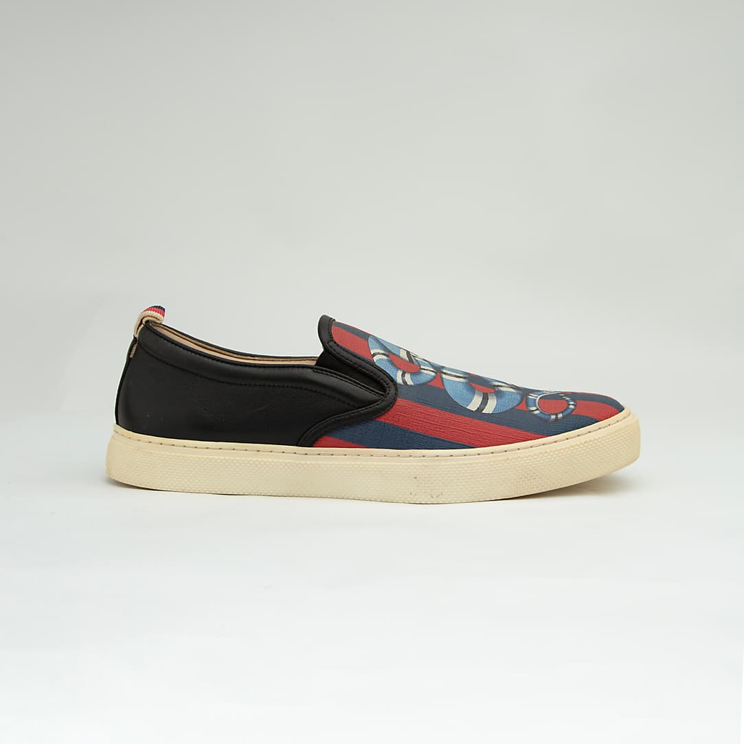 The Garden Serpent Slip-On is a high-luxury, casual shoe that blends Gucci's iconic heritage web with bold, striking graphic art.
