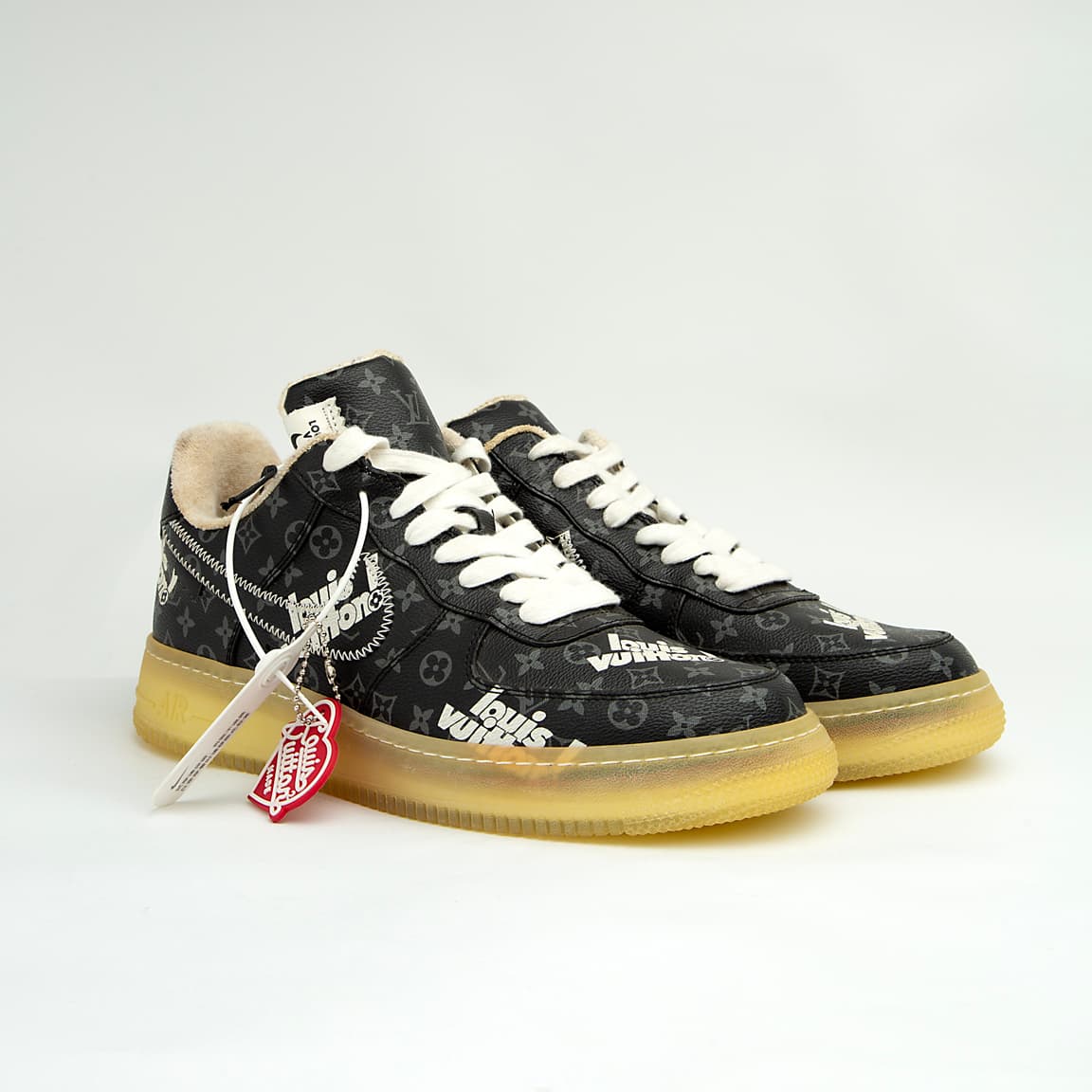 This is a highly exclusive, low-top sneaker from the iconic Louis Vuitton x Nike Air Force 1 collaboration, designed by Virgil Abloh for the Louis Vuitton Spring-Summer 2022 Men's Collection.