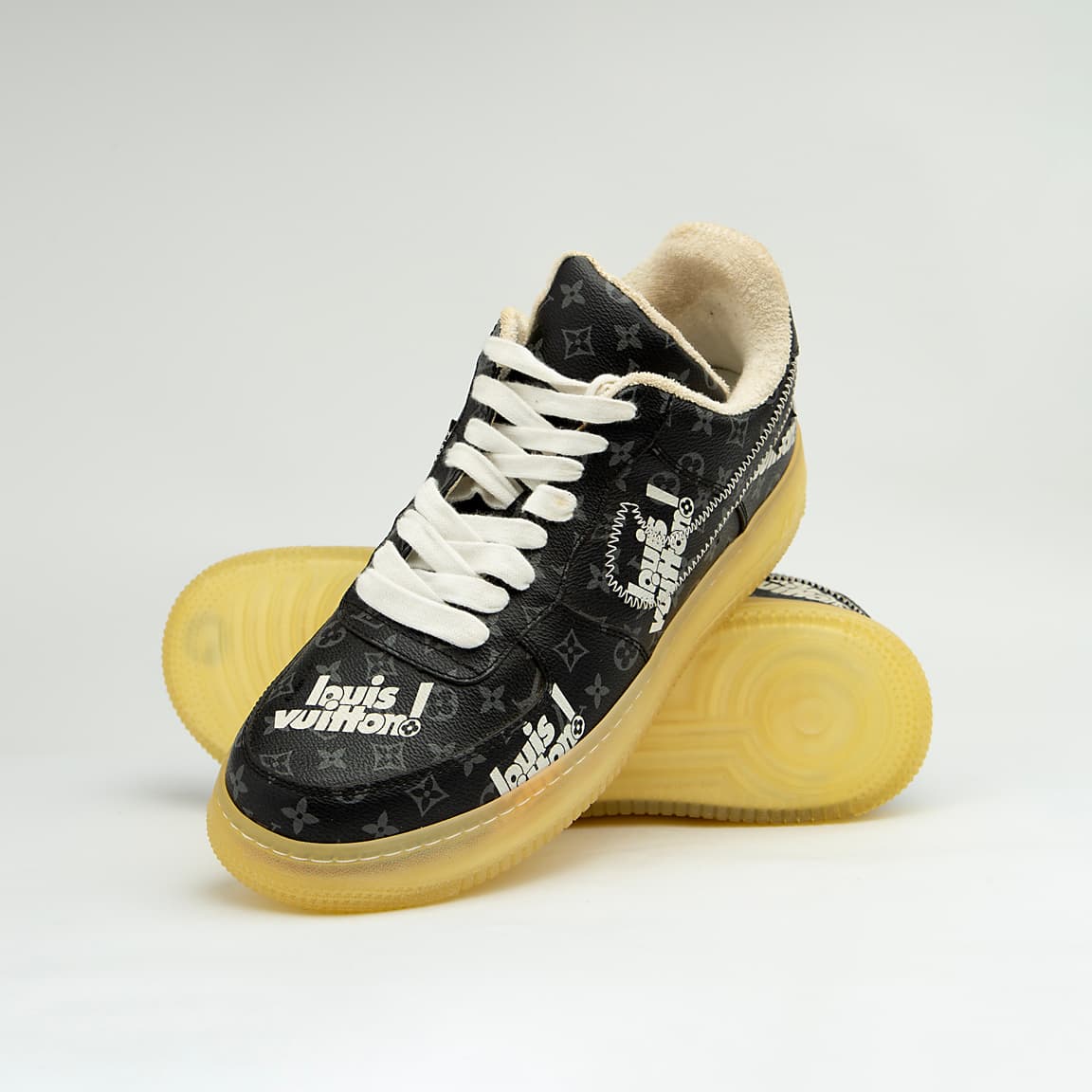 This is a highly exclusive, low-top sneaker from the iconic Louis Vuitton x Nike Air Force 1 collaboration, designed by Virgil Abloh for the Louis Vuitton Spring-Summer 2022 Men's Collection.