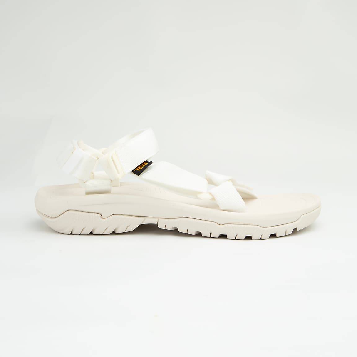 White all-terrain adjustable unisex outdoor sandals with EVA sole and hook-and-loop straps.