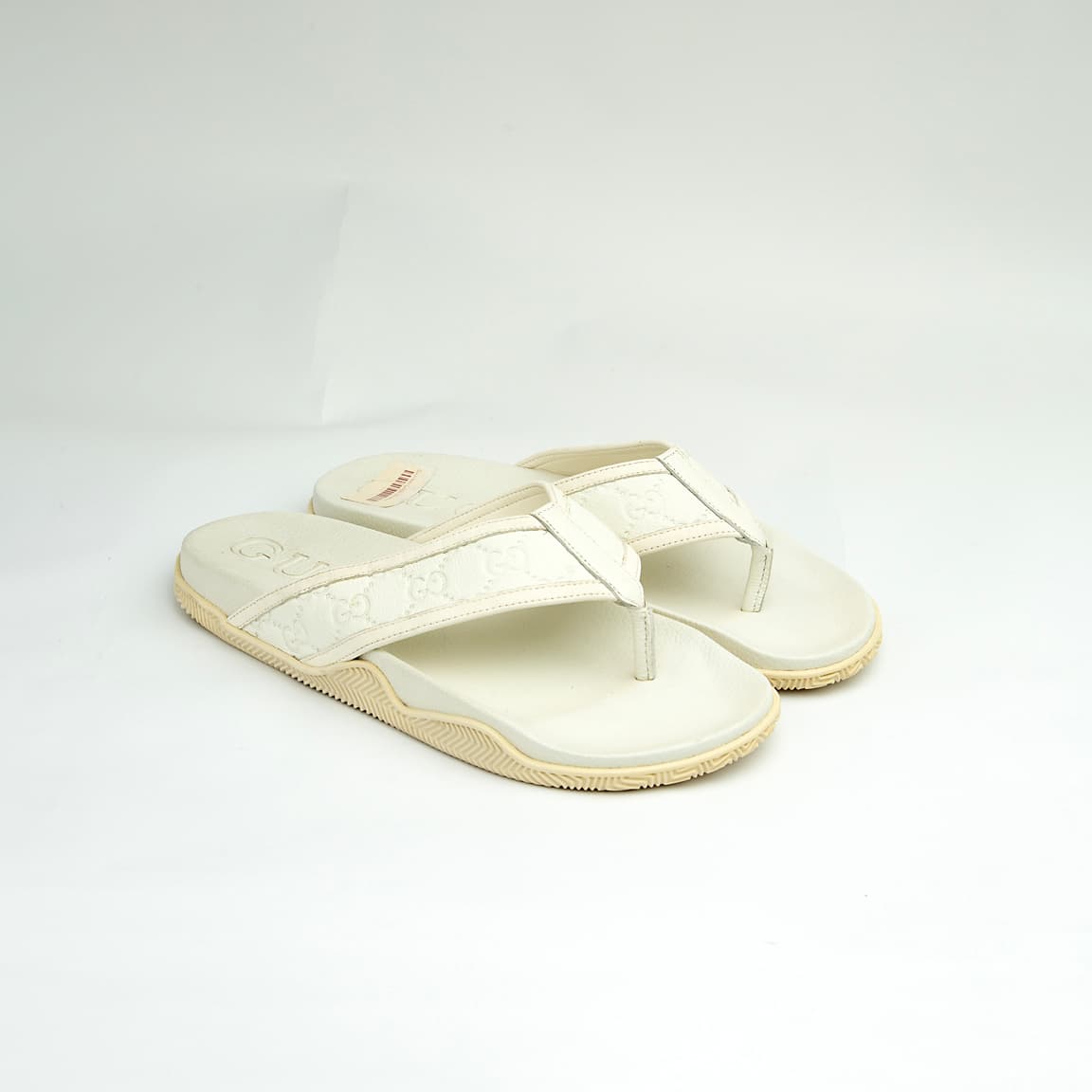 The Riviera Monogram Thong is a sophisticated, luxurious flip-flop designed for upscale resort or casual wear.