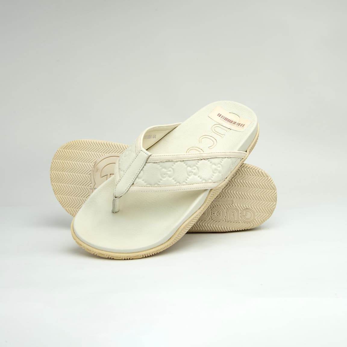 The Riviera Monogram Thong is a sophisticated, luxurious flip-flop designed for upscale resort or casual wear.