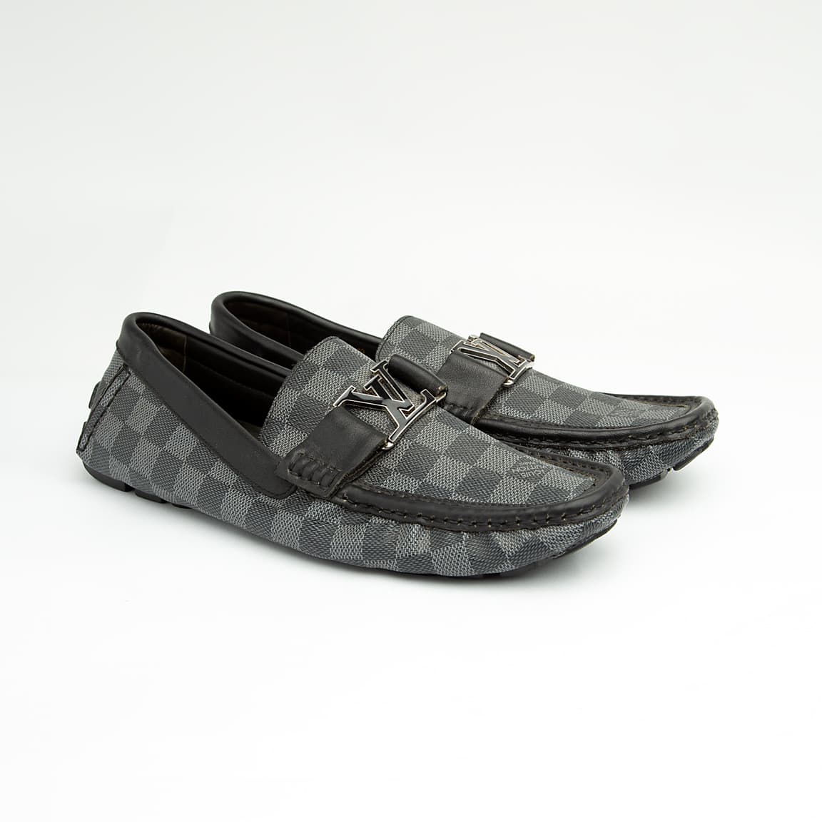 The Graphite Damier Roadster is a luxurious, classic slip-on driving moccasin.