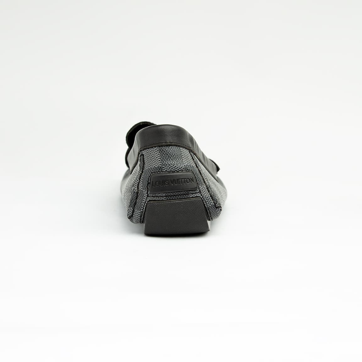 The Graphite Damier Roadster is a luxurious, classic slip-on driving moccasin.