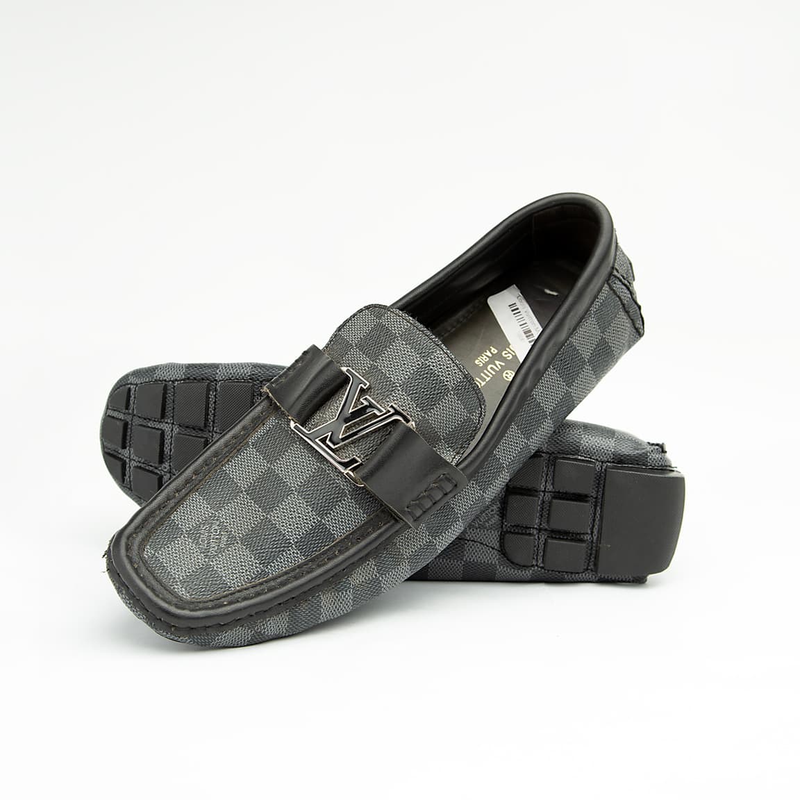The Graphite Damier Roadster is a luxurious, classic slip-on driving moccasin.