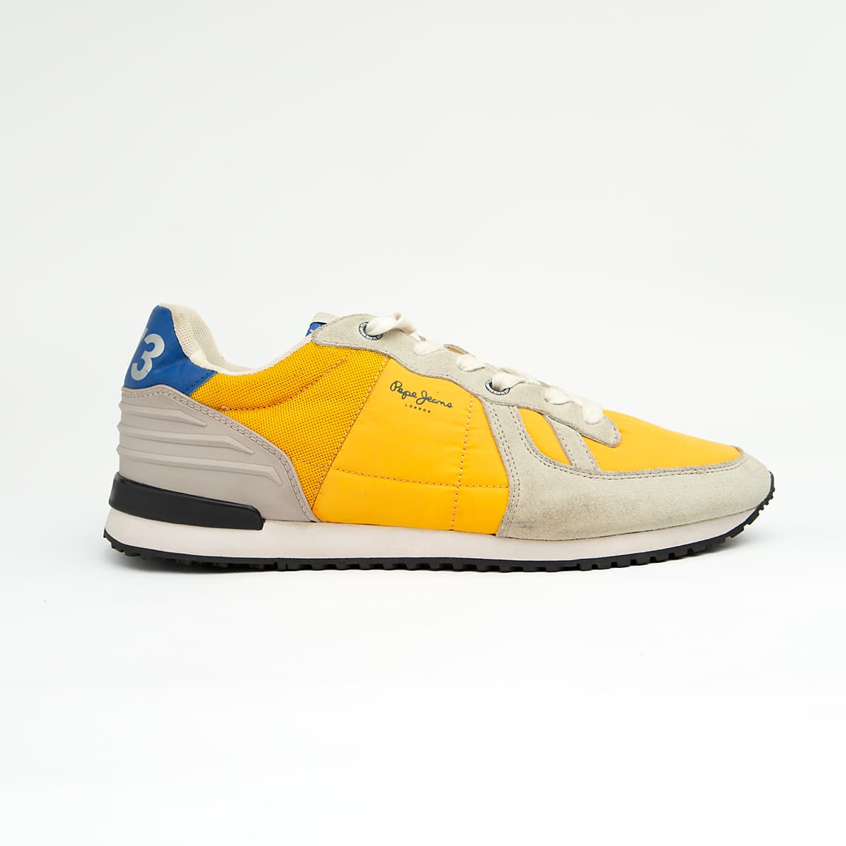 The Canary Retro Cruiser is a bright, casual runner-style sneaker that embodies vintage athletic design.