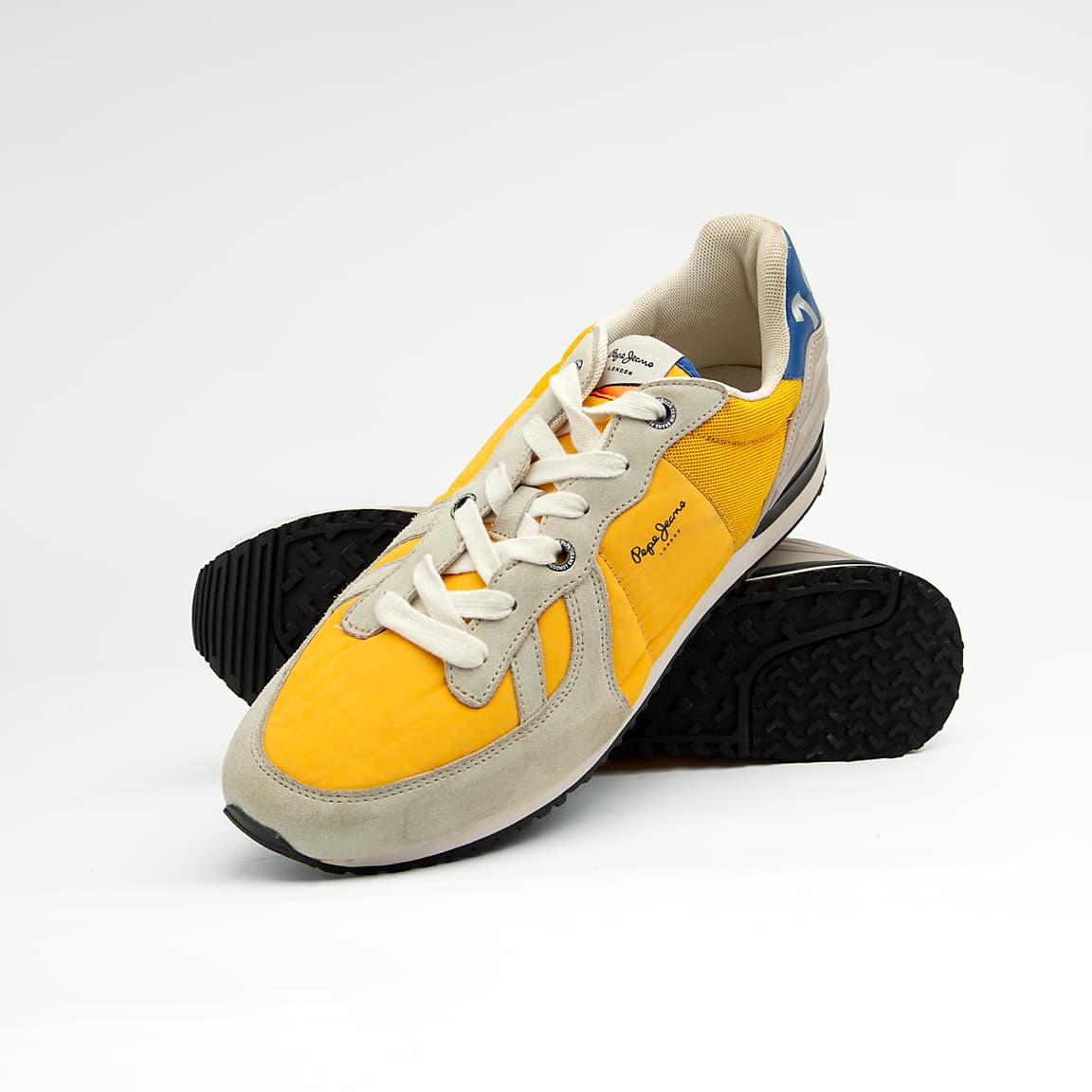 The Canary Retro Cruiser is a bright, casual runner-style sneaker that embodies vintage athletic design.