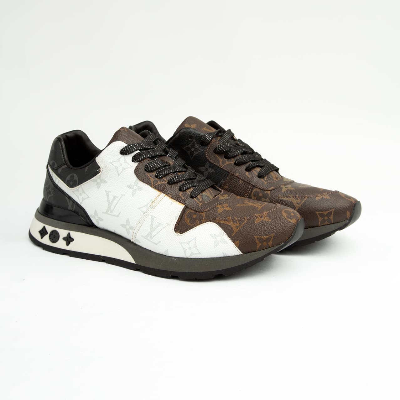 Louis Vuitton brown and white dual-tone unisex sneakers with monogram pattern and black sole, premium designer footwear.