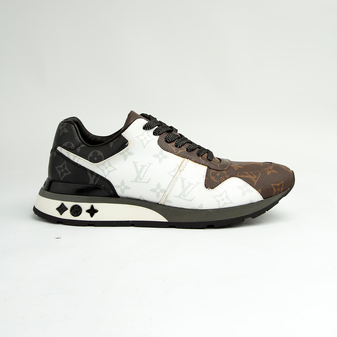 Louis Vuitton brown and white dual-tone unisex sneakers with monogram pattern and black sole, premium designer footwear.