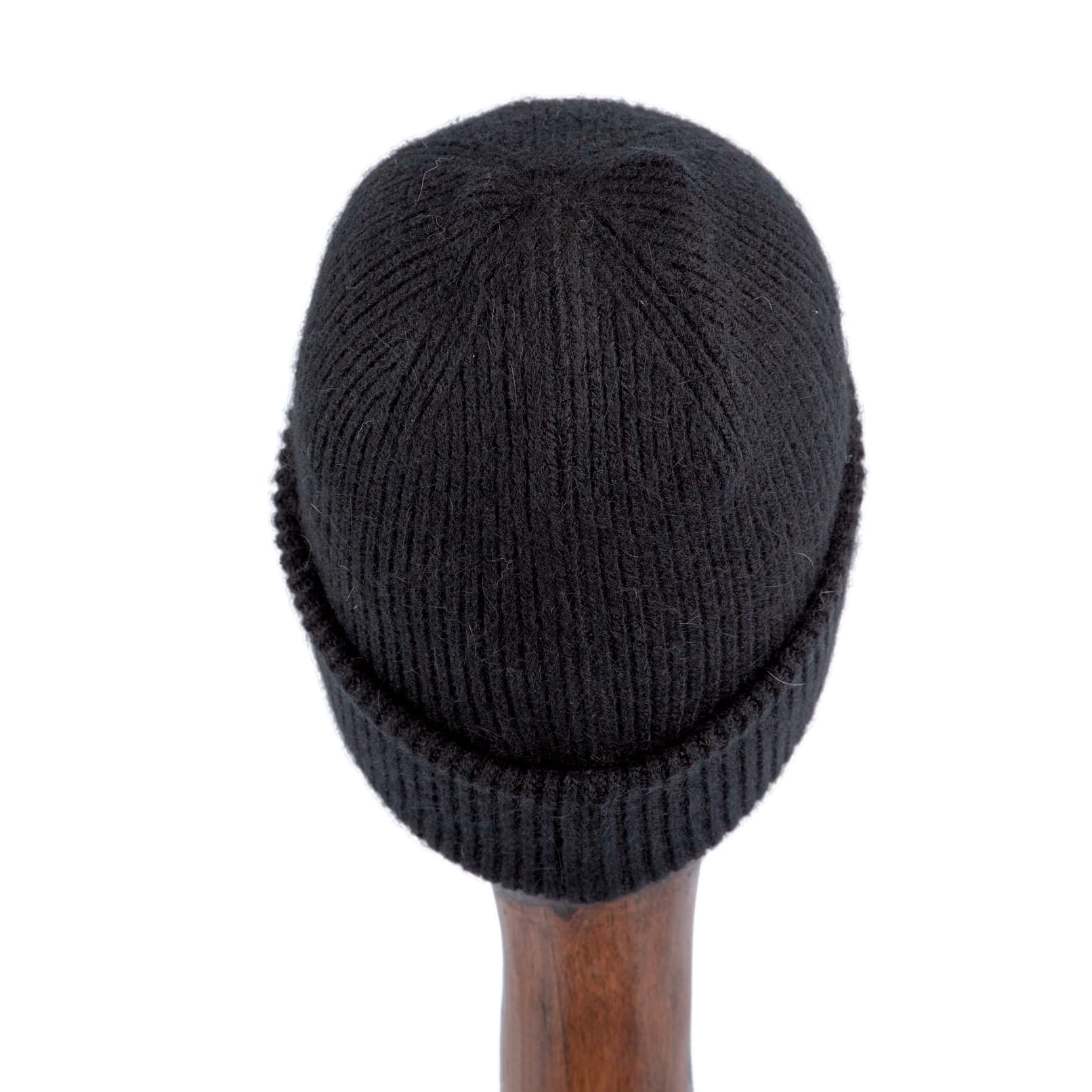 Black luxury knitted beanie with gold-studded logo emblem for men and women, soft and warm winter accessory available on Agu.ng.