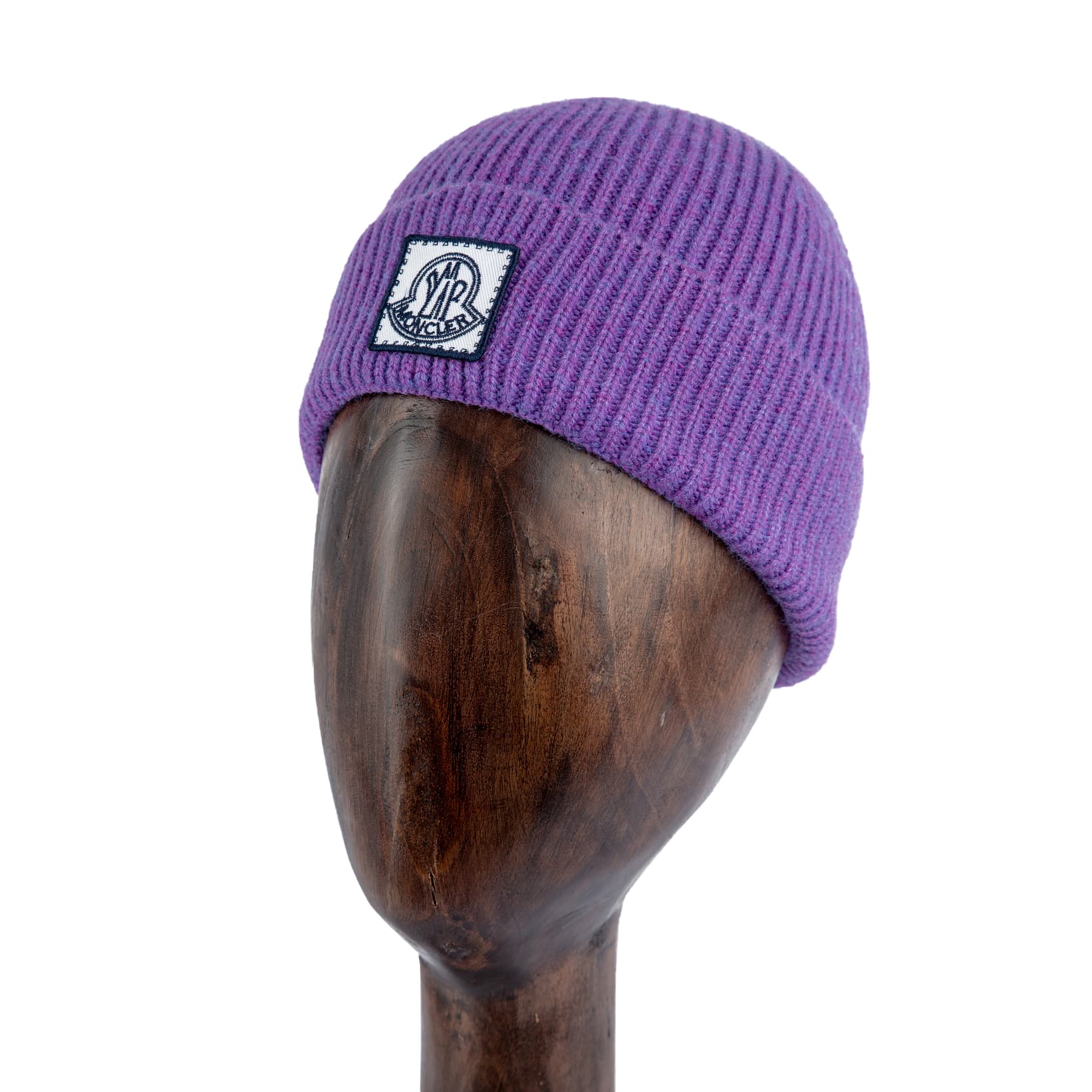 Ribbed Knit Wool Beanie in vibrant purple with iconic logo patch, designed for winter warmth and style.