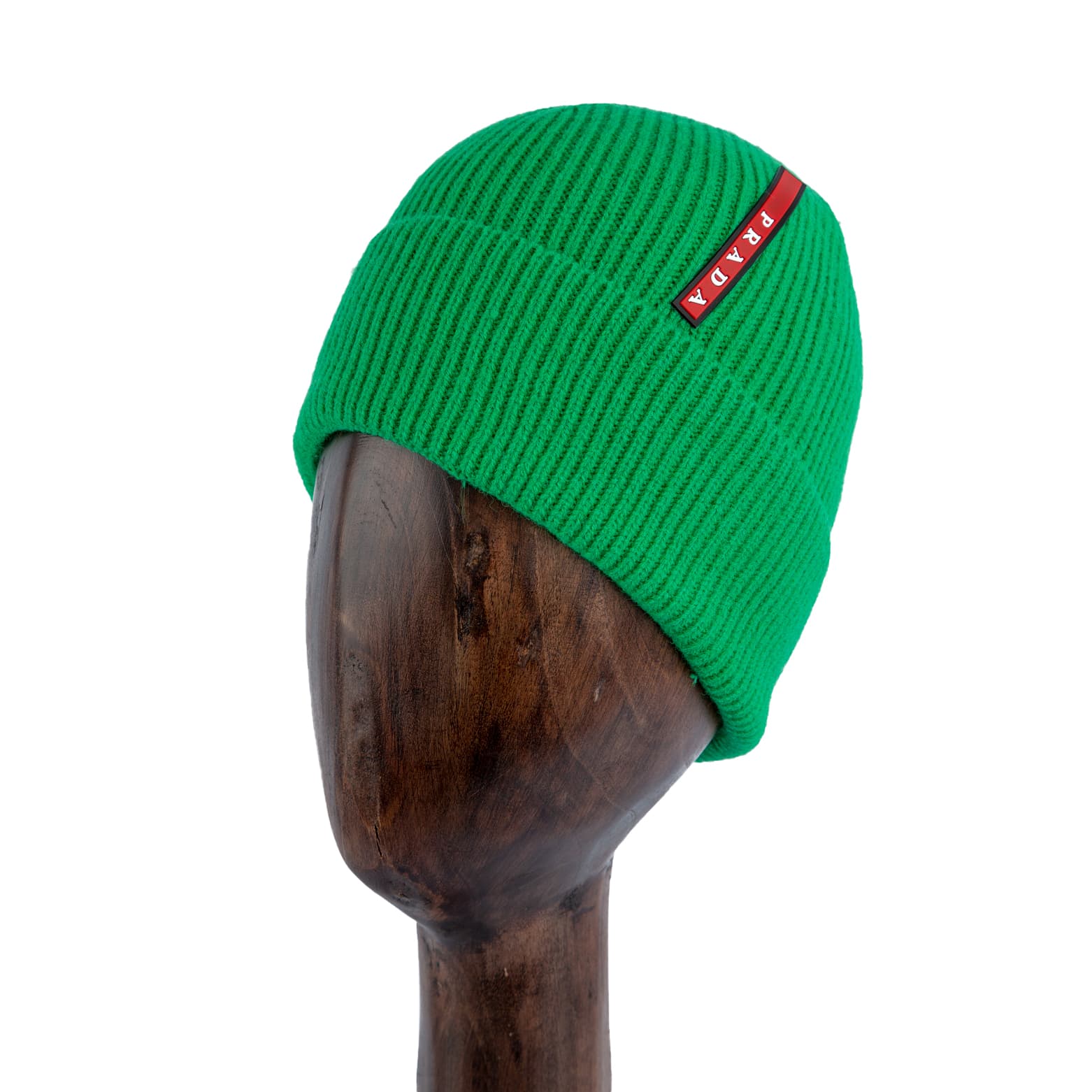 Ribbed Knit Wool Beanie Head warmer in bright green with red logo tag, perfect for stylish winter warmth.