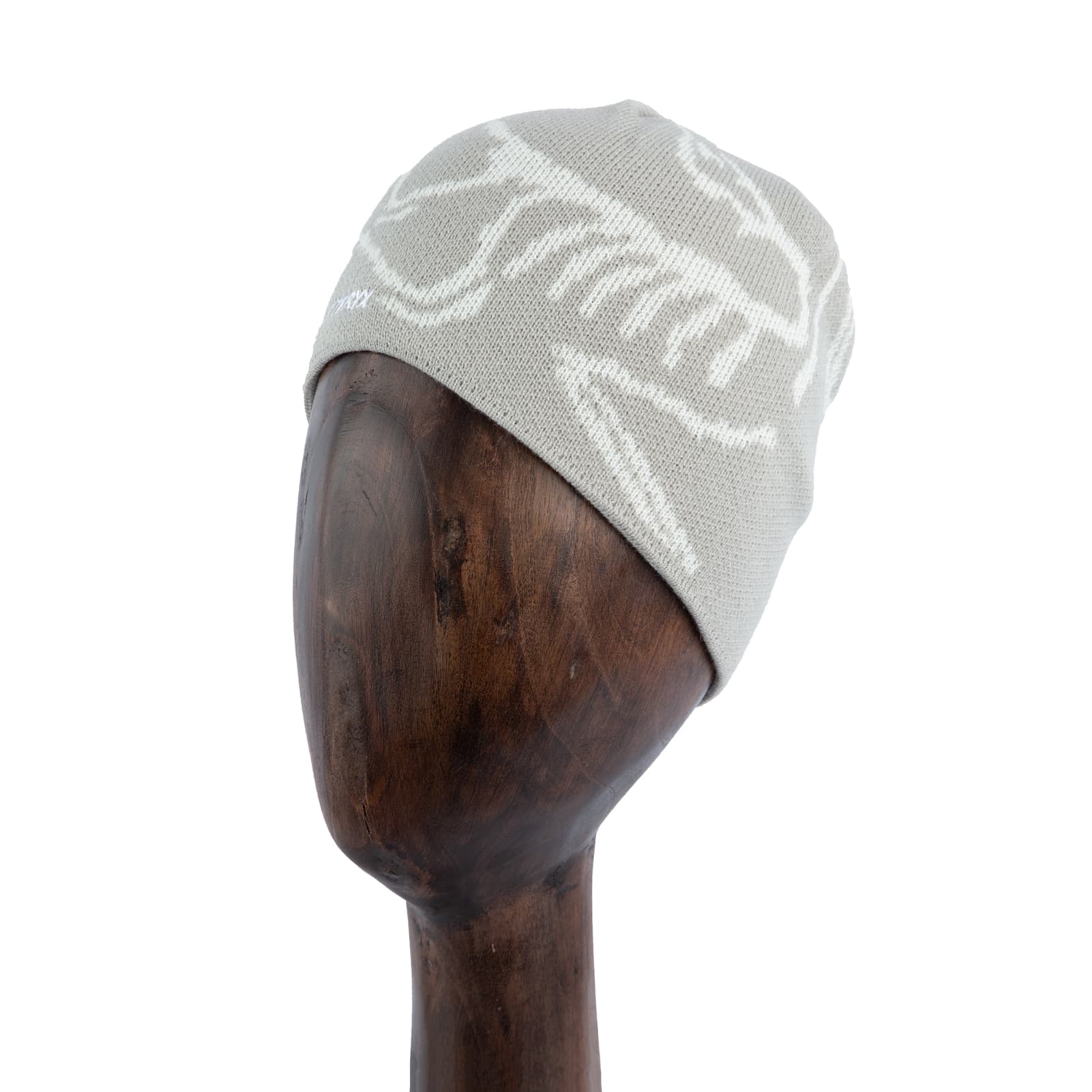 Grey knit beanie with white logo design, premium winter hat.