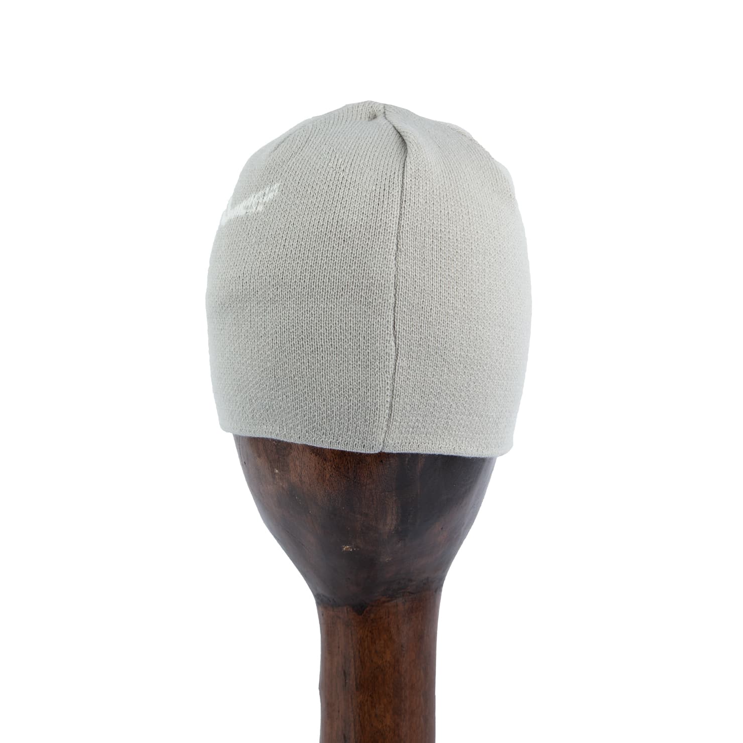 Grey knit beanie with white logo design, premium winter hat.