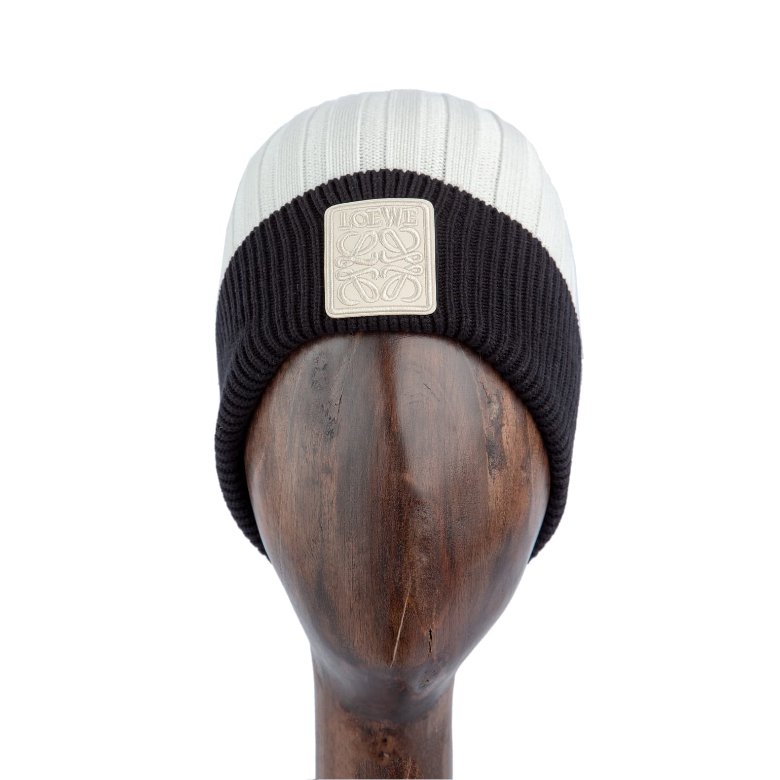 Ribbed knit  beanie hat in black and white with logo patch