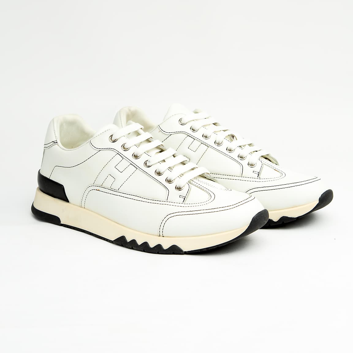 This sneaker perfectly balances classic athletic form with high-end craftsmanship.