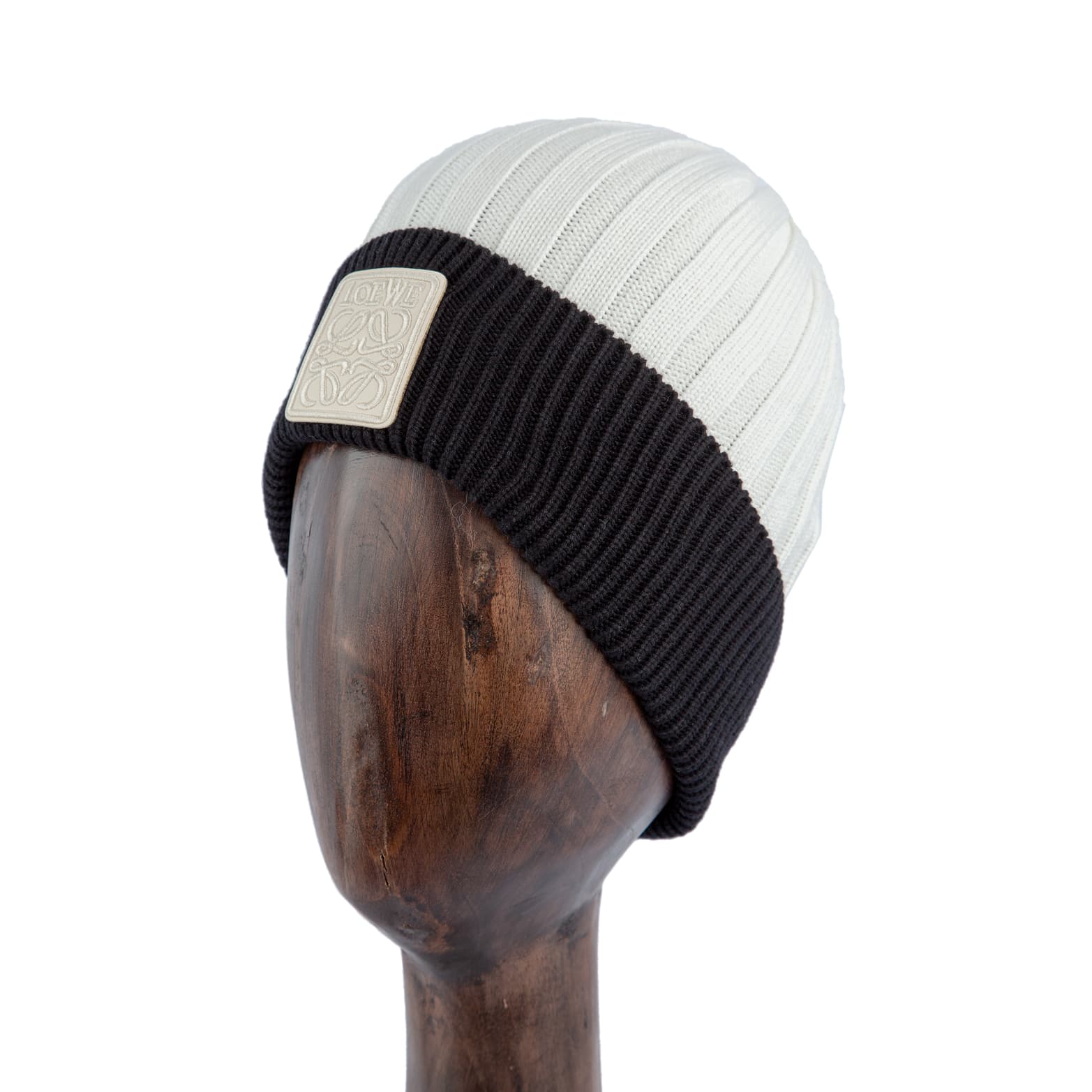 Ribbed knit  beanie hat in black and white with logo patch