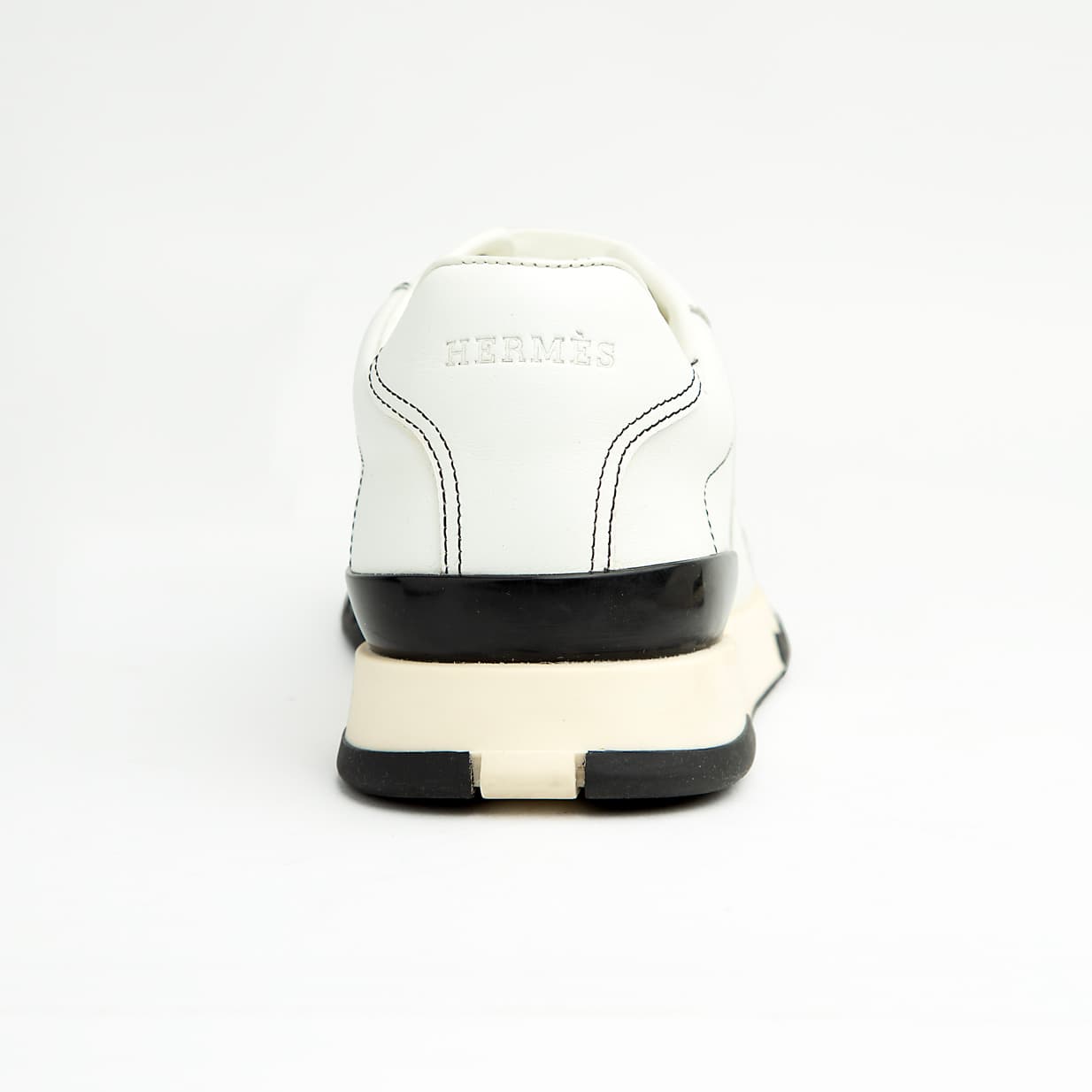 This sneaker perfectly balances classic athletic form with high-end craftsmanship.