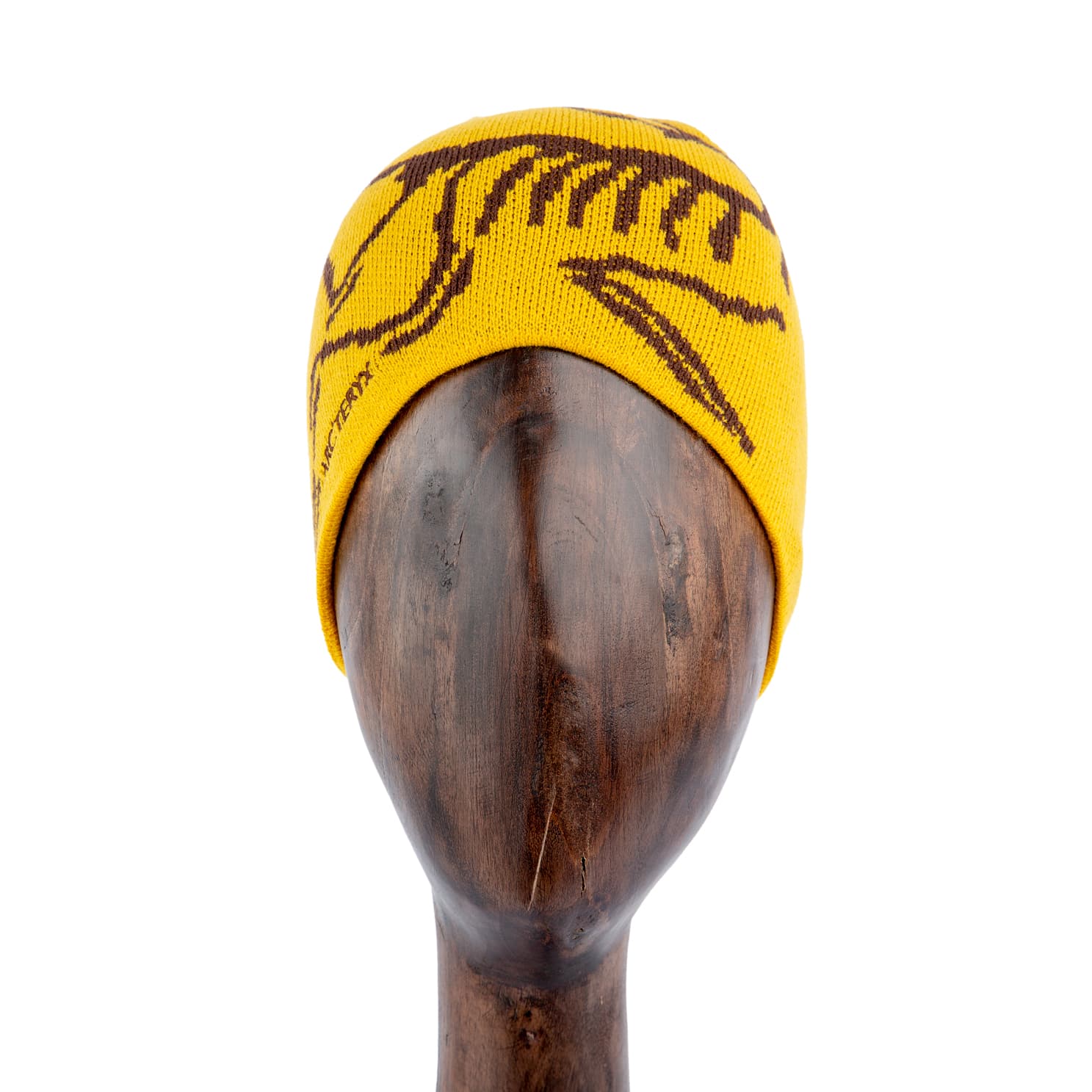 Yellow knit beanie with bold graphic pattern in dark brown