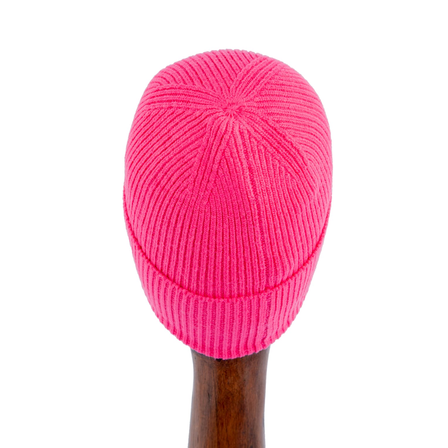 Bright pink ribbed knit beanie with white luxury monogram embroidery, unisex winter hat.