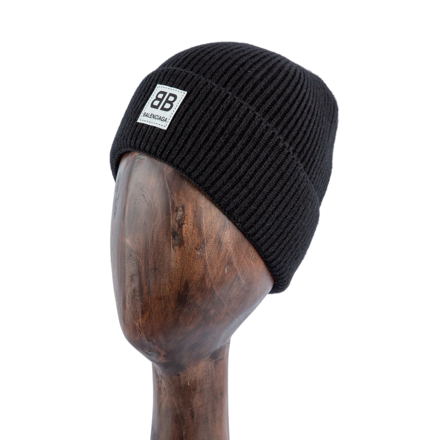 Black ribbed knit beanie with BB logo patch, unisex winter hat.