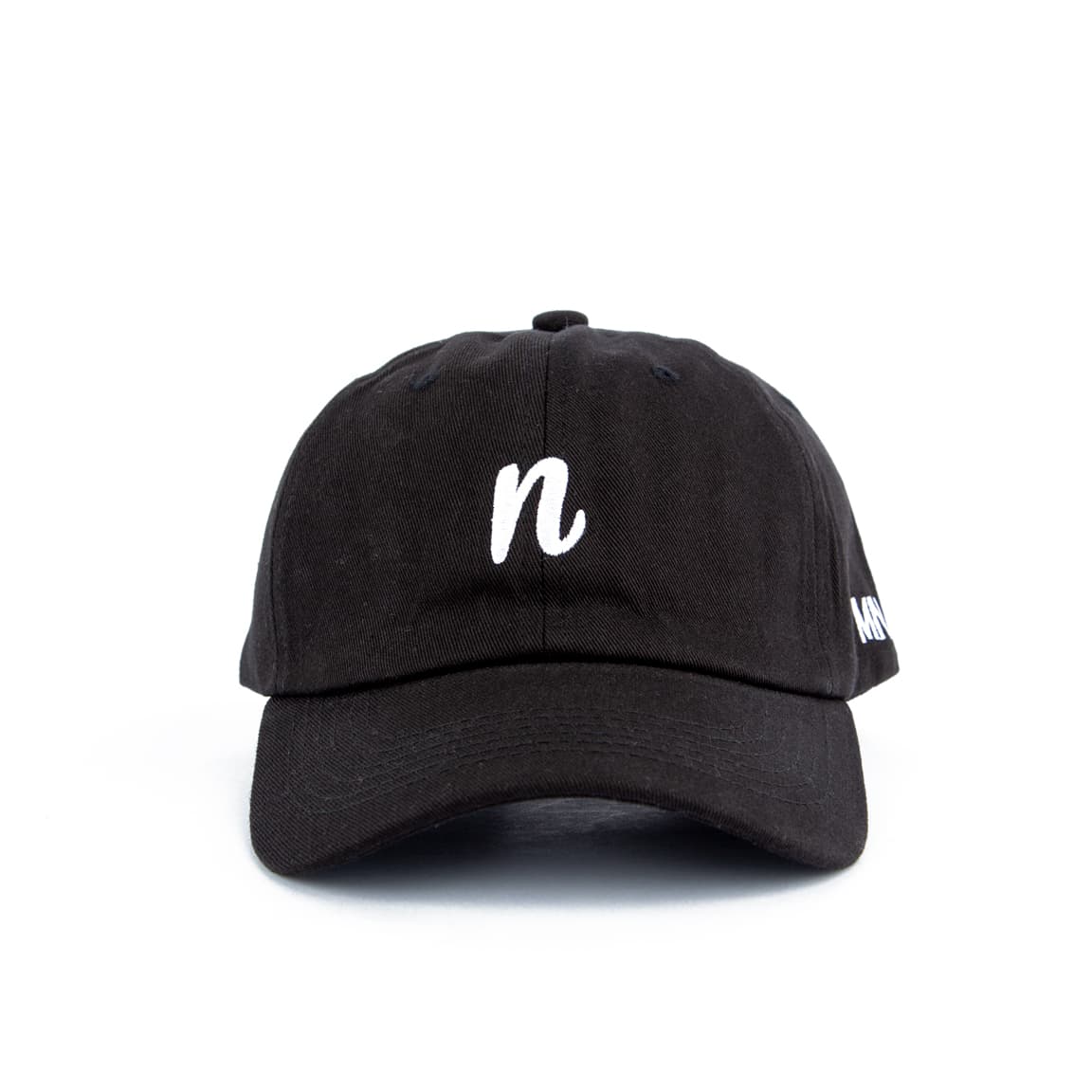 Black minimalist embroidered face cap with white 'n' design, unisex and adjustable, perfect for casual and modern style enthusiasts.