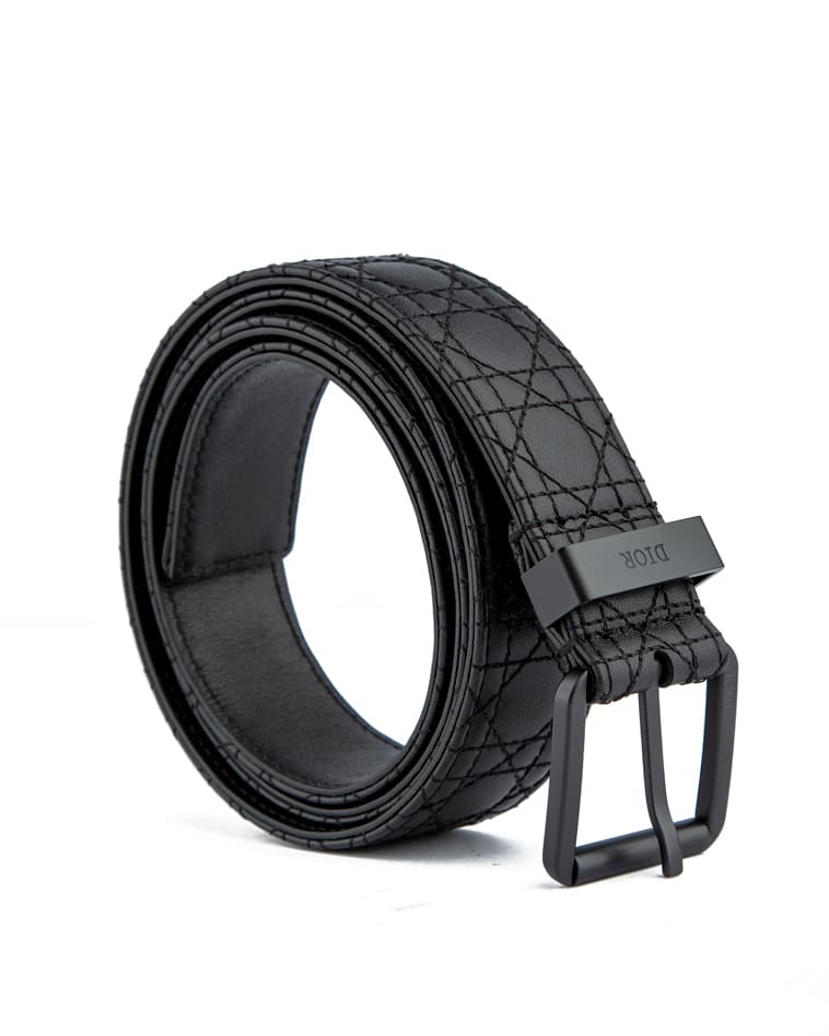 Luxury black quilted leather belt with a sleek matte black buckle, perfect for men and women seeking a refined and sophisticated fashion accessory.