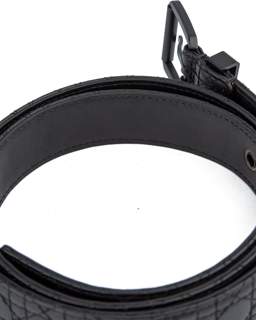 Luxury black quilted leather belt with a sleek matte black buckle, perfect for men and women seeking a refined and sophisticated fashion accessory.
