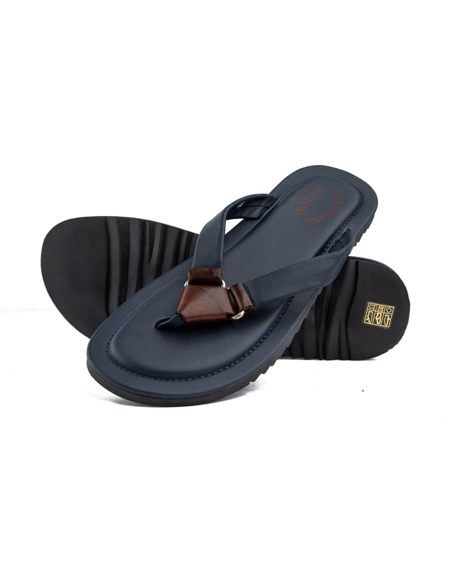 Men's navy blue thong sandals with brown contrast detail.