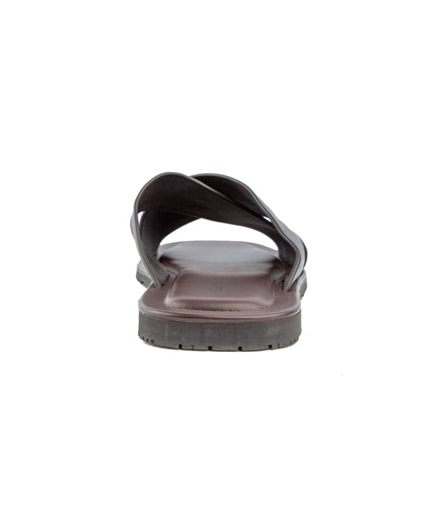 Elegant black cross-strap leather sandals with cushioned footbed and durable rubber sole, offering both comfort and style for casual and semi-formal wear.