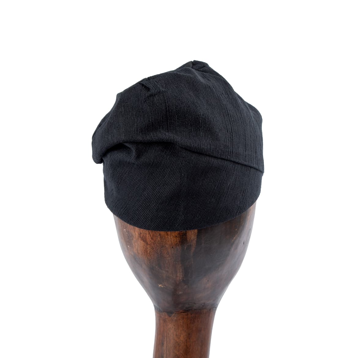 Traditional Yoruba Fila: A culturally significant headwear, crafted with vibrant fabrics like Aso Oke and Adire.