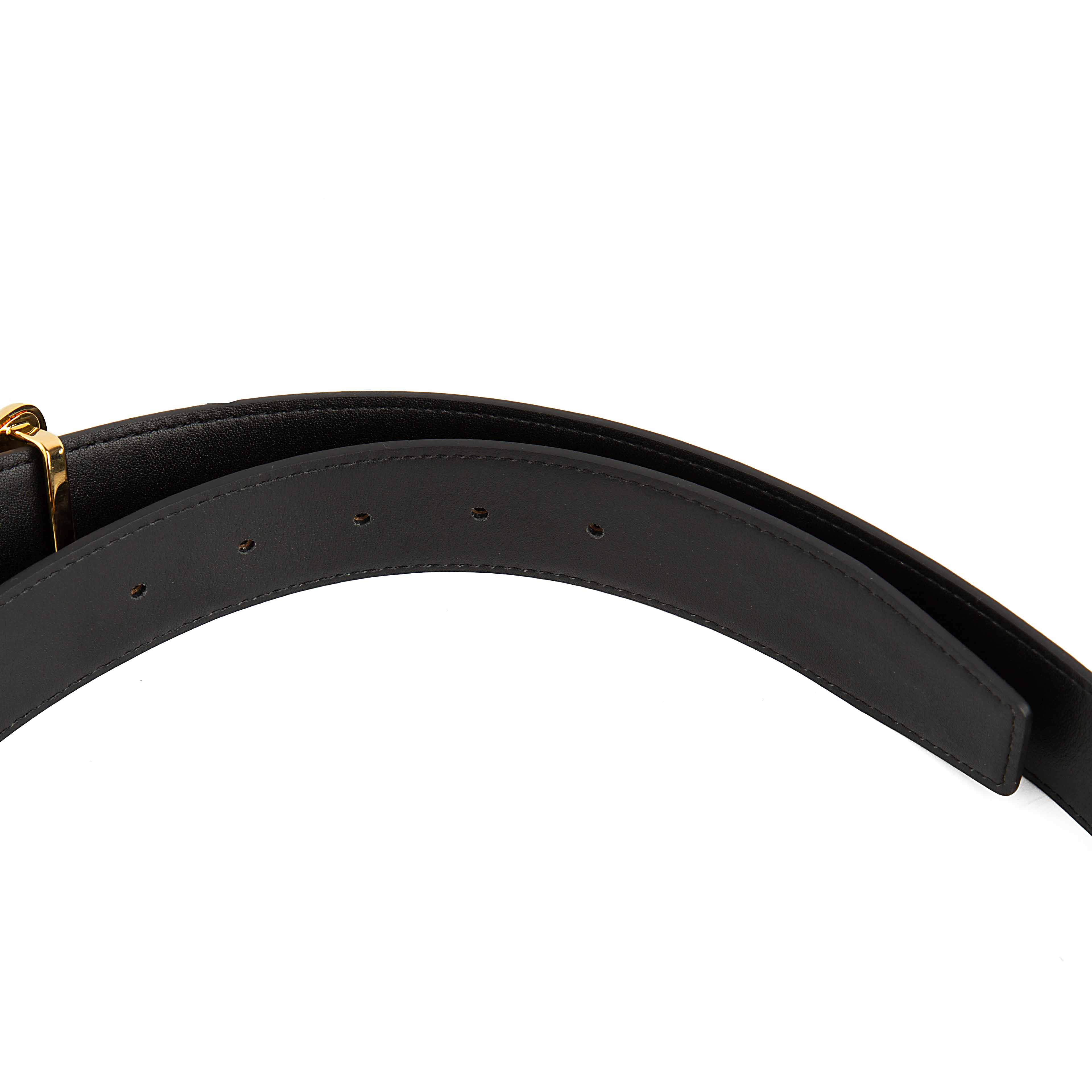 This statement accessory elevates the classic black leather belt through intricate detailing.