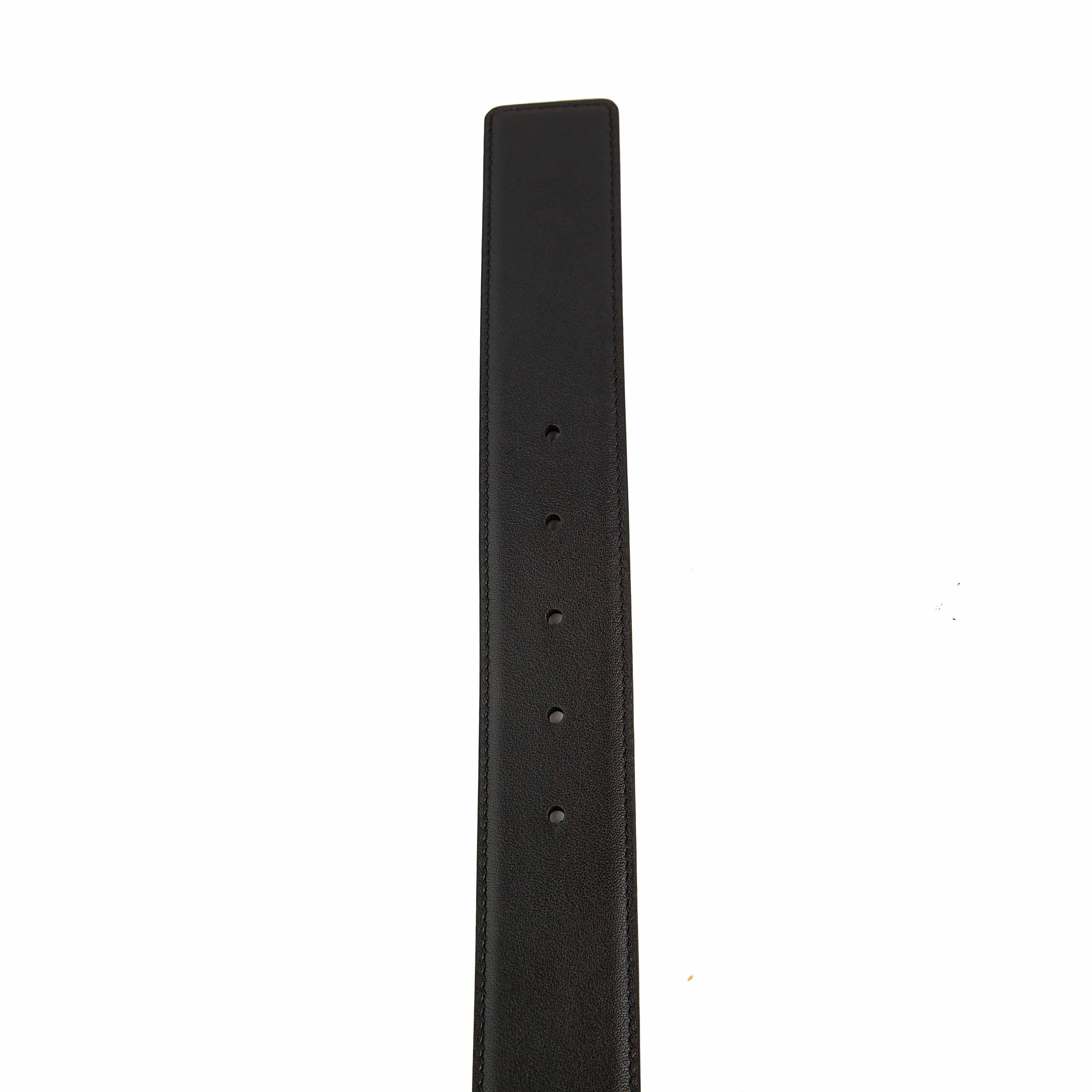 This is a luxurious and instantly recognizable Black Leather Belt defined by its iconic hardware.